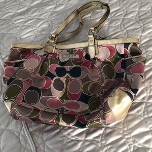 Barely under Coach bag